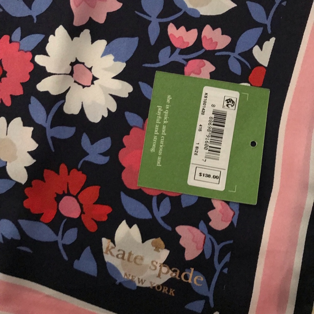 A beautiful oblong scarf from Kate spade .